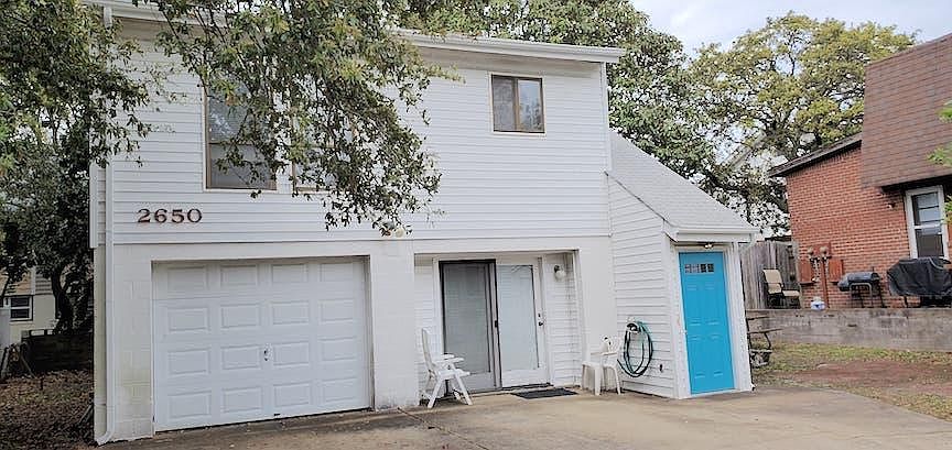 Unit entrance is through turquoise door - 2nd floor unit