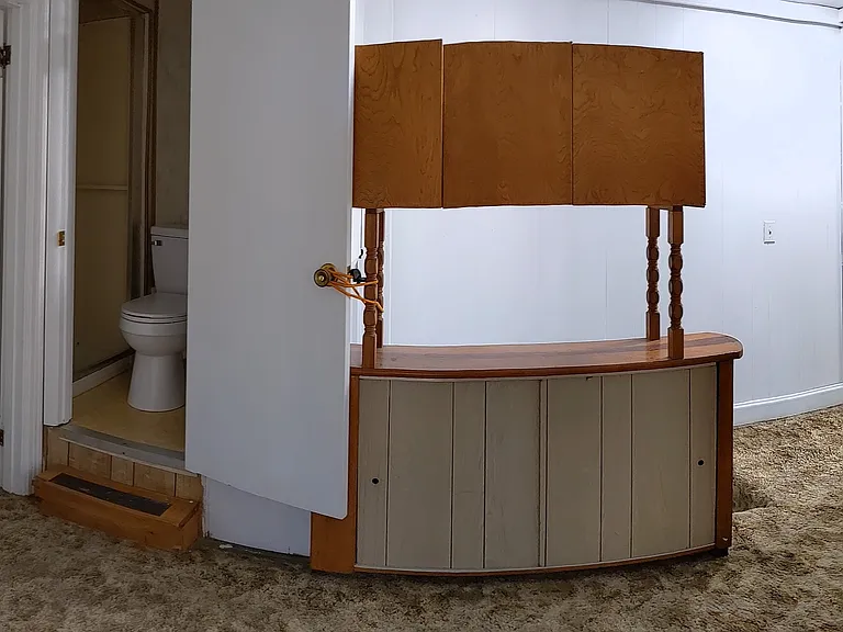 Third floor, office/playroom with a convenient half bathroom