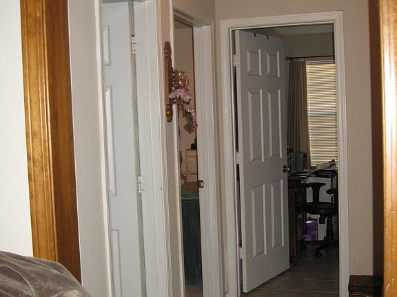 hallway to extra bedrooms, bath, and laundry room