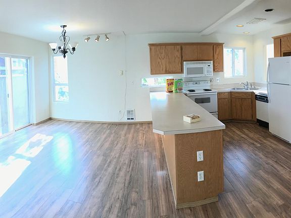 Inside has nice open area with slider access to the back yard.