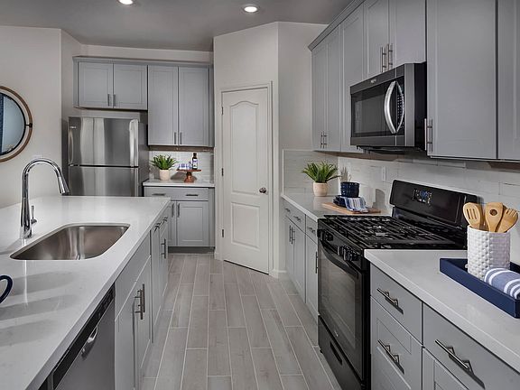 This floorplan modeled at a nearby Meritage community.
