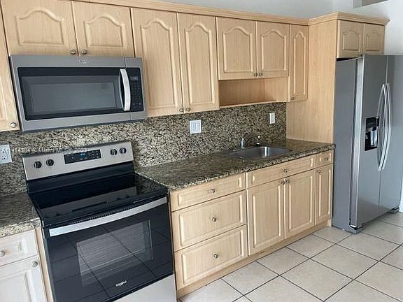 5th image of 6900 NW 179th St APT 208-1