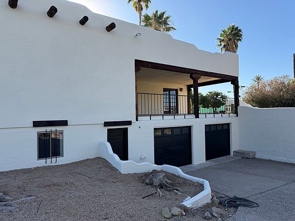 rear 2 story showing Garage & Patio