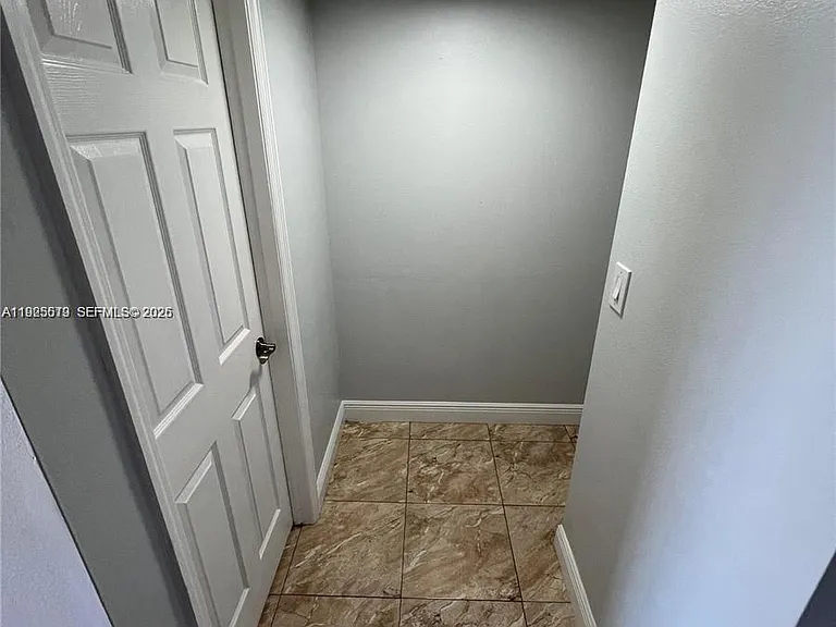 1075 W 68th St #218 — Photo 14