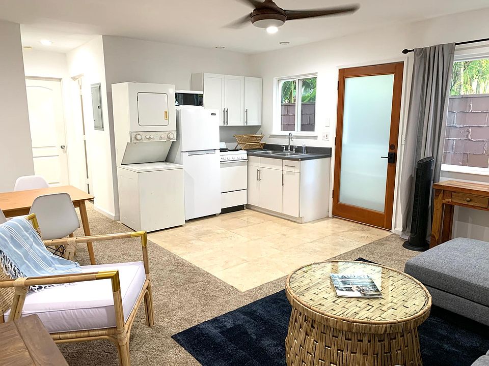 This is a picture of the nearly identical lower unit. The upstairs condo has a slightly larger kitchen counter since the entry way is located down the hallway towards the bed/bath.