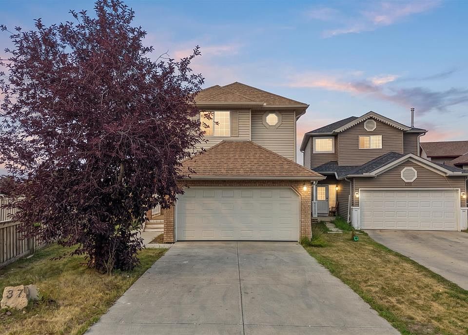 1st image of 187 E Martinvalley Cres NE
