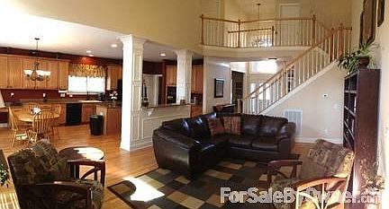 Spacious open floor plan
						:
						Large two story great room with gas burning fireplace, open to the large kitchen