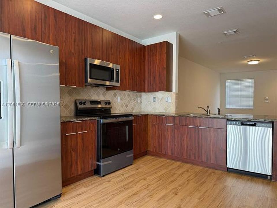 1st image of 14958 SW 41st Ln #Townhouse 14958