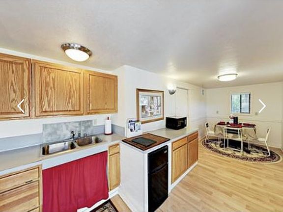 Kitchen with large storage living room