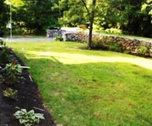 Front Yard with Stone Wall