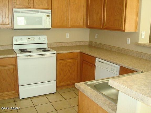 Nice size kitchen with big Pantry next to separate Laundry Room.