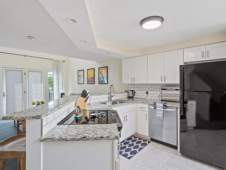 Fully equipped kitchen from fridge to dishwasher, air fryer, coffee pot, and all cooking necessities