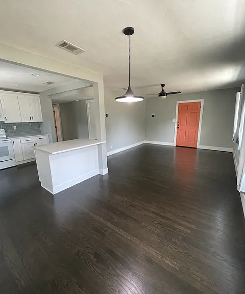Dining and breakfast area with views of the open-concept living room.