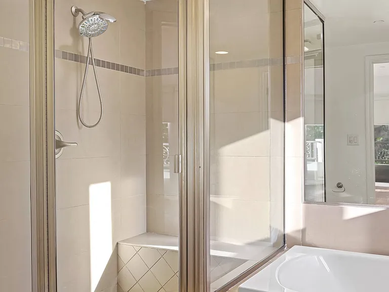 Bathroom with Stand-Up Shower and Full Size Bathtub