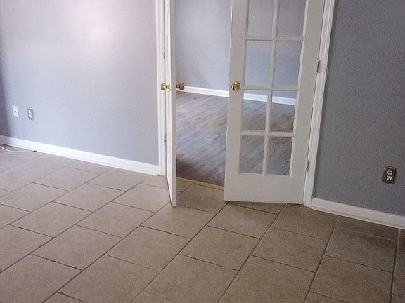 living room and entrance to bonus room or 2nd bedroom