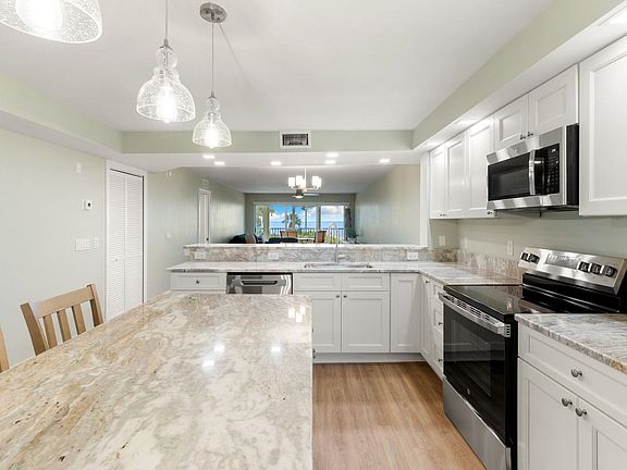 4th image of 3049 W Gulf Dr Unit 101