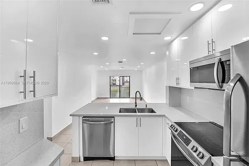 7668 SW 152nd Ave #2-211 Photo 1
