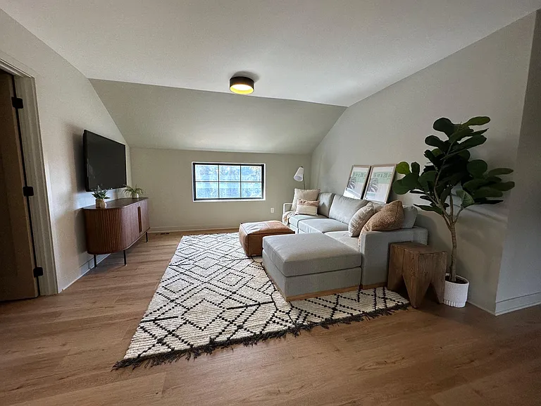 Upper loft area acts as a second living space.