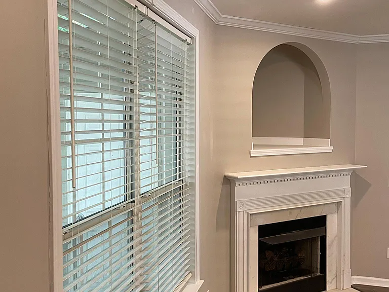 DEN WITH FIREPLACE, NEW HARDWOODS AND NEW BLINDS.
