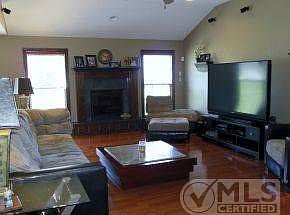 Large living with fireplace