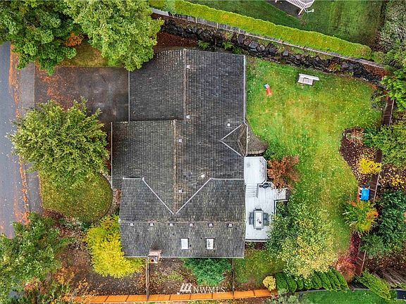 The spacious yards in the neighborhood provide nice privacy and the landscaping is low maintenance & lovely