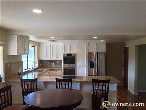 New recessed lighting in kitchen and living space