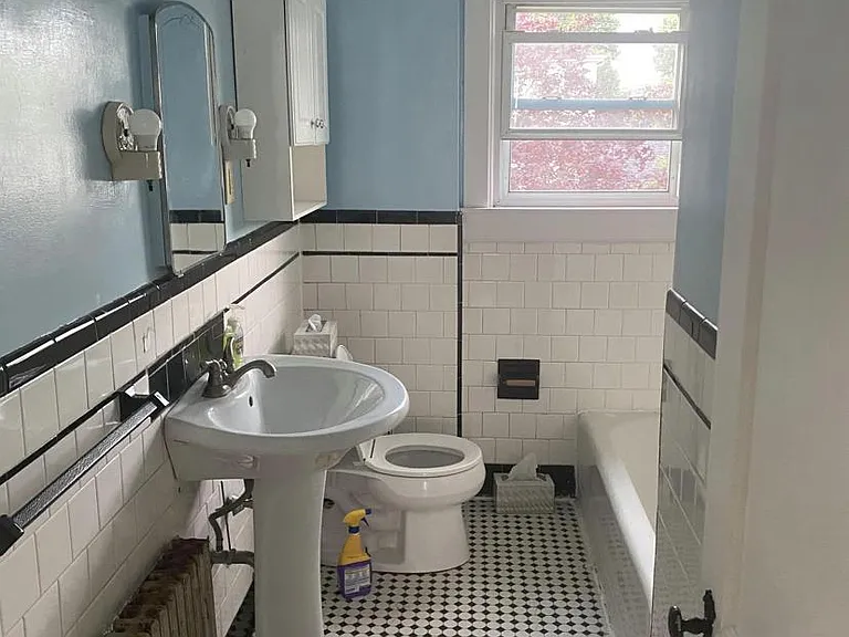 Bathroom with tub and shower