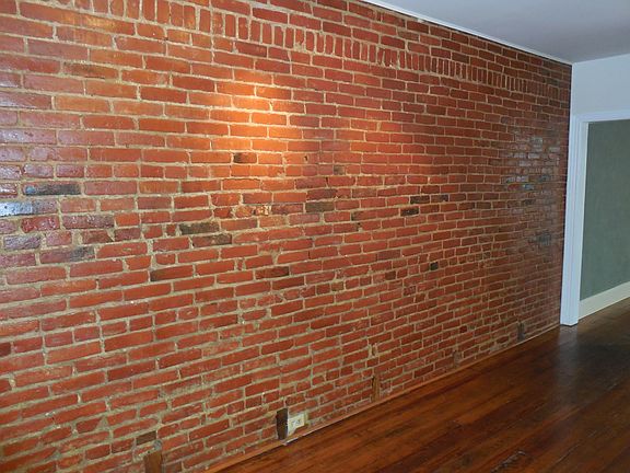 Gorgeous exposed brick in 3 rooms