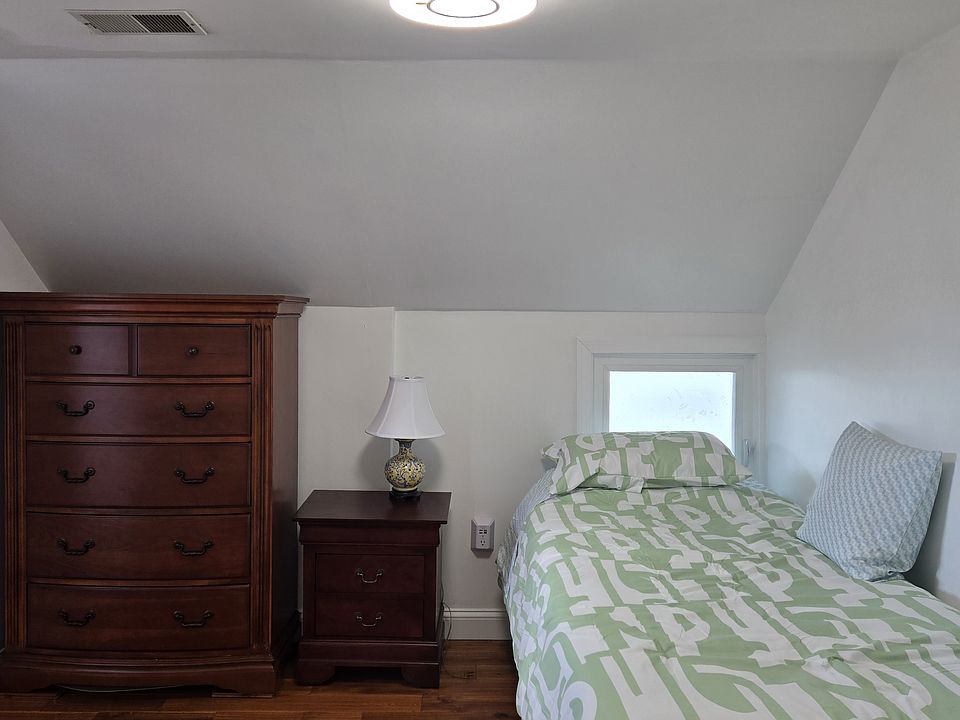 Your room with a twin bed.