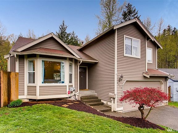 Street appeal abounds here.  The bay window makes a grand statement and the covered entry is fun for seasonal decorating.
