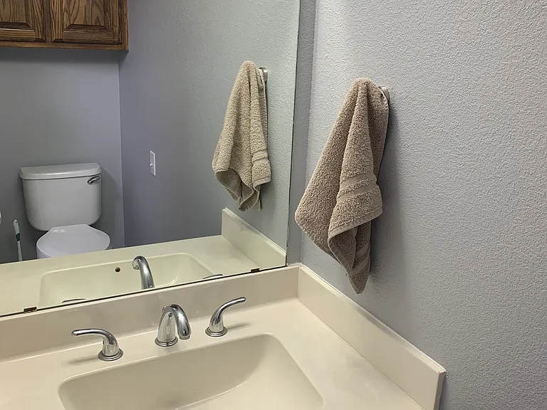 1/2 bath off Laundry Room by Garage entry