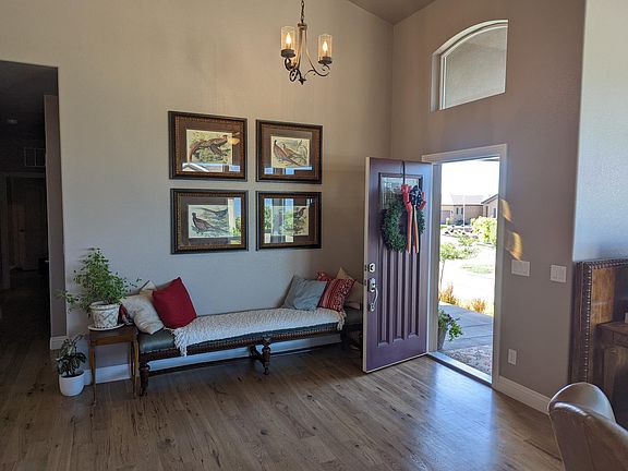 Beautiful open foyer from front covered porch & open southwest patio