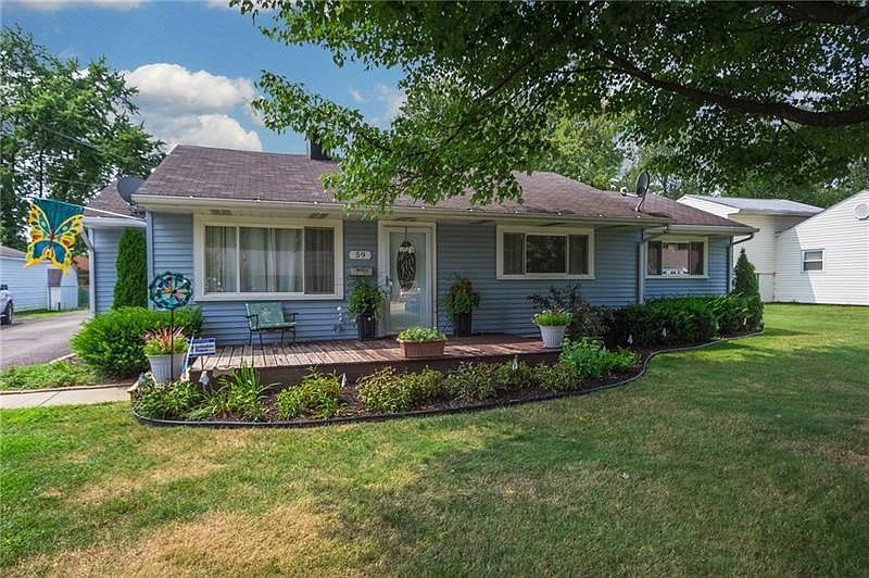 Welcome to 59 Walnut Street. Beautiful curb appeal.