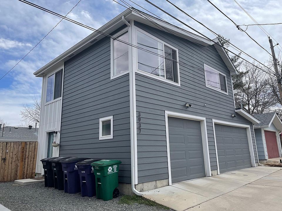 Apartment is located above the garage. The single garage door is dedicated to the apartment.