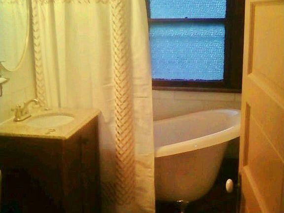 Hall Bath 2nd fl w/Slipper Tub, Curare Wall Tiles, Slate Fl, Vanity w/Granite
