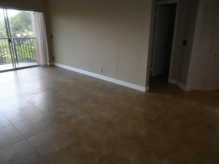 8721 Wiles Rd #305 — Photo 38