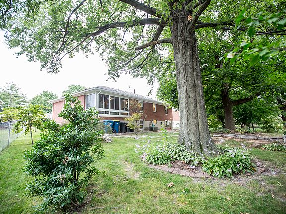 back view with sunroom