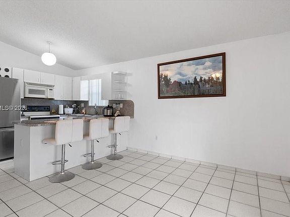 4th image of 7568 W 4th Ct