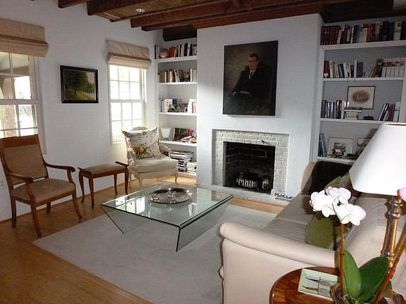 Living Room with Fireplace & Built-in Shelving