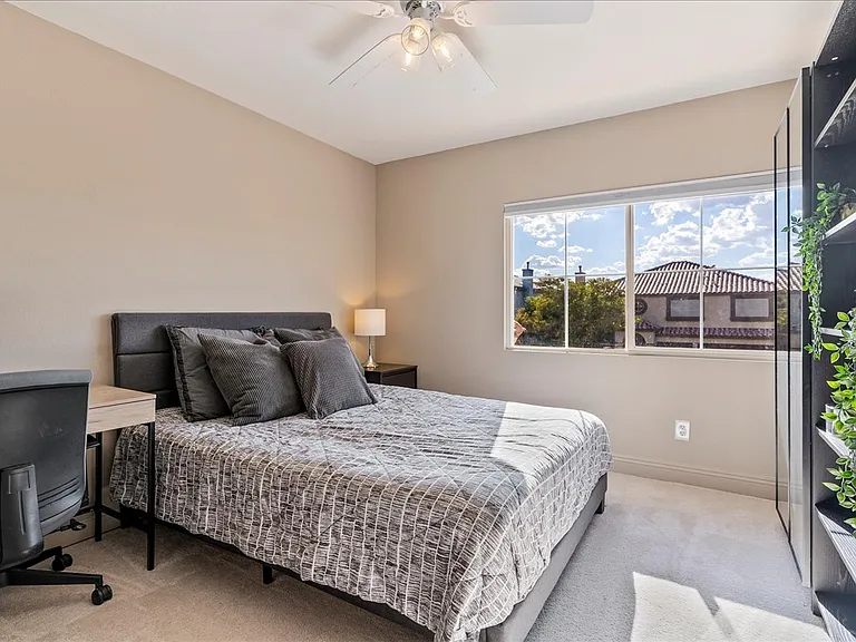 Bedroom 3 with lots of storage, queen bed and workstation