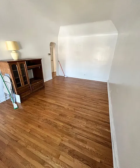 LIVING ROOM WITH ARCHITECTURAL CEILINGS