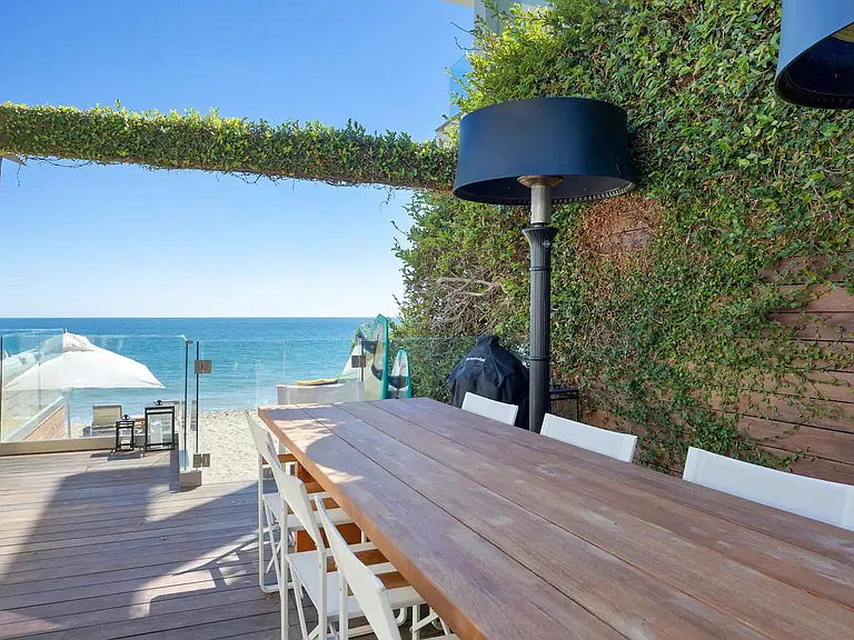 Alfresco dining table with a Nobu style heat lamp.