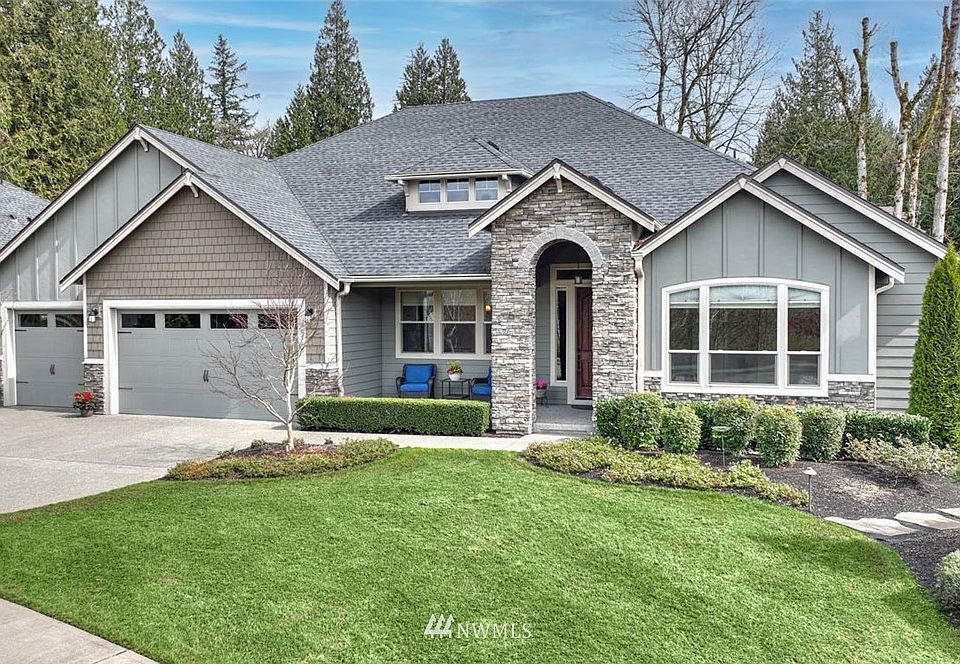 Gorgeous Garrette Custom Homes rambler is designed for entertaining, with all the convenience of everything on one level.