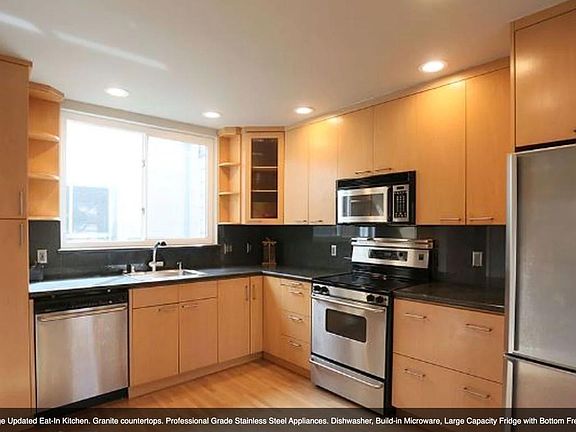 Kitchen. Lots of cabinets and storage space. Granite countertops. Stainless steel appliances. D/W, garbage disposal, microwave, glasstop stove, large fridge?