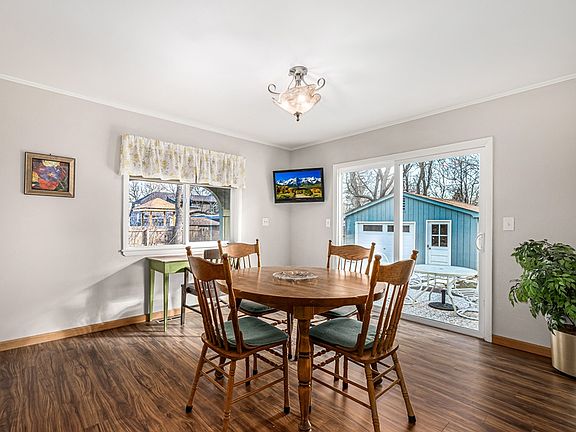 Expandable dining table seats 4-8 guests.