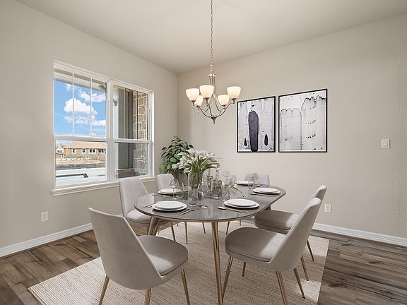 Formal dining room. Note Sample product photo - actual exterior and interior selections may vary.