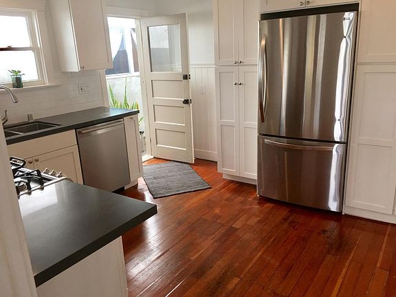 kitchen w washer & dryer in cabinet