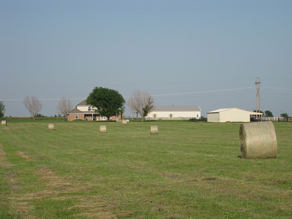 Back pasture with hay bales