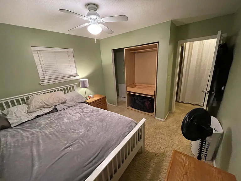 Living Room - Come unfurnished, and has been painted since but wanted to show it with bed/etc in place.