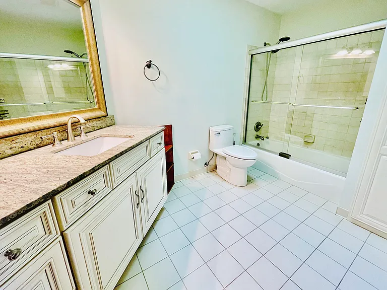 Spacious Upgraded Second Floor Bathroom with Skylight.